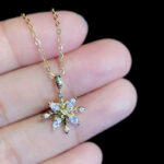 Pendentif flocon de neige doré en argent et zircon et sa chaîne