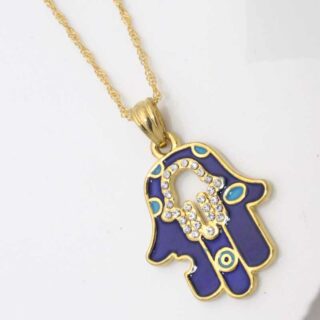 Photo d'un pendentif man de fatma original violet et doré sur une chaine