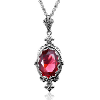 Pendentif en pierre de rubis rouge avec des contours argentés style gothique