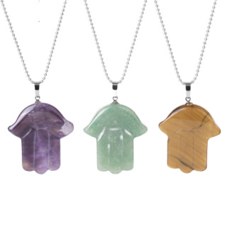 Photo de pendentif de main de fatma en pierres naturelles