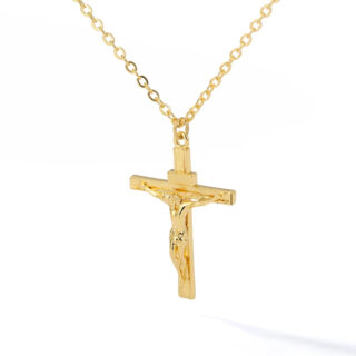 Pendentif croix doré avec Jésus sur fond blanc