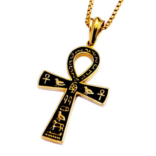 Pendentif croix égyptienne noire et dorée sur fond blanc