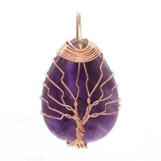 Pendentif pierre naturelle au design de goutte d’eau sur fond blanc